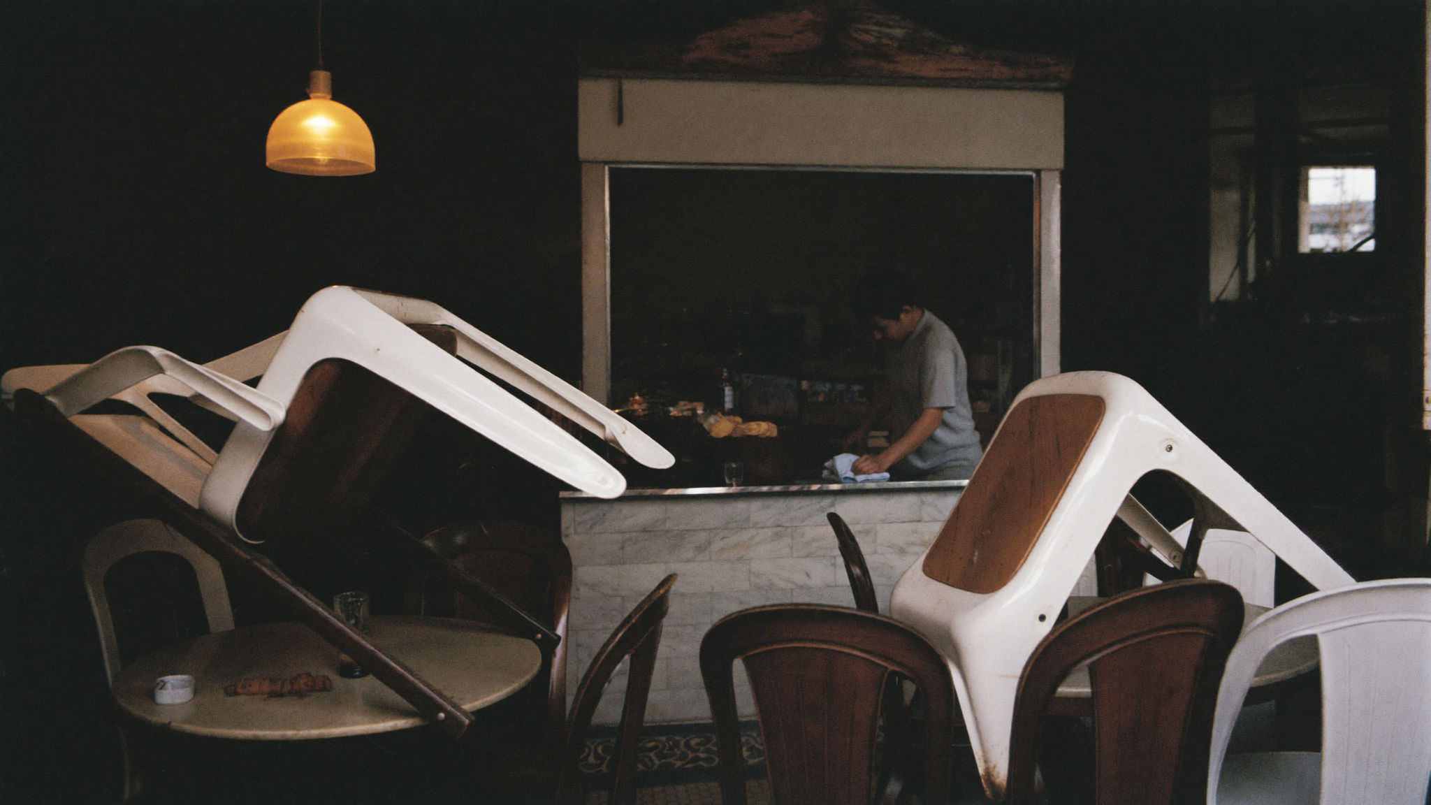 Chairs up and lights low at closing time